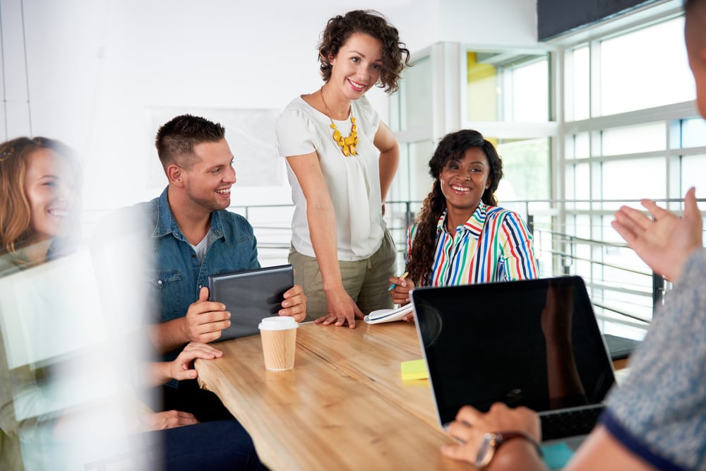 Employees meeting with their Managed IT Services Team at Sentry