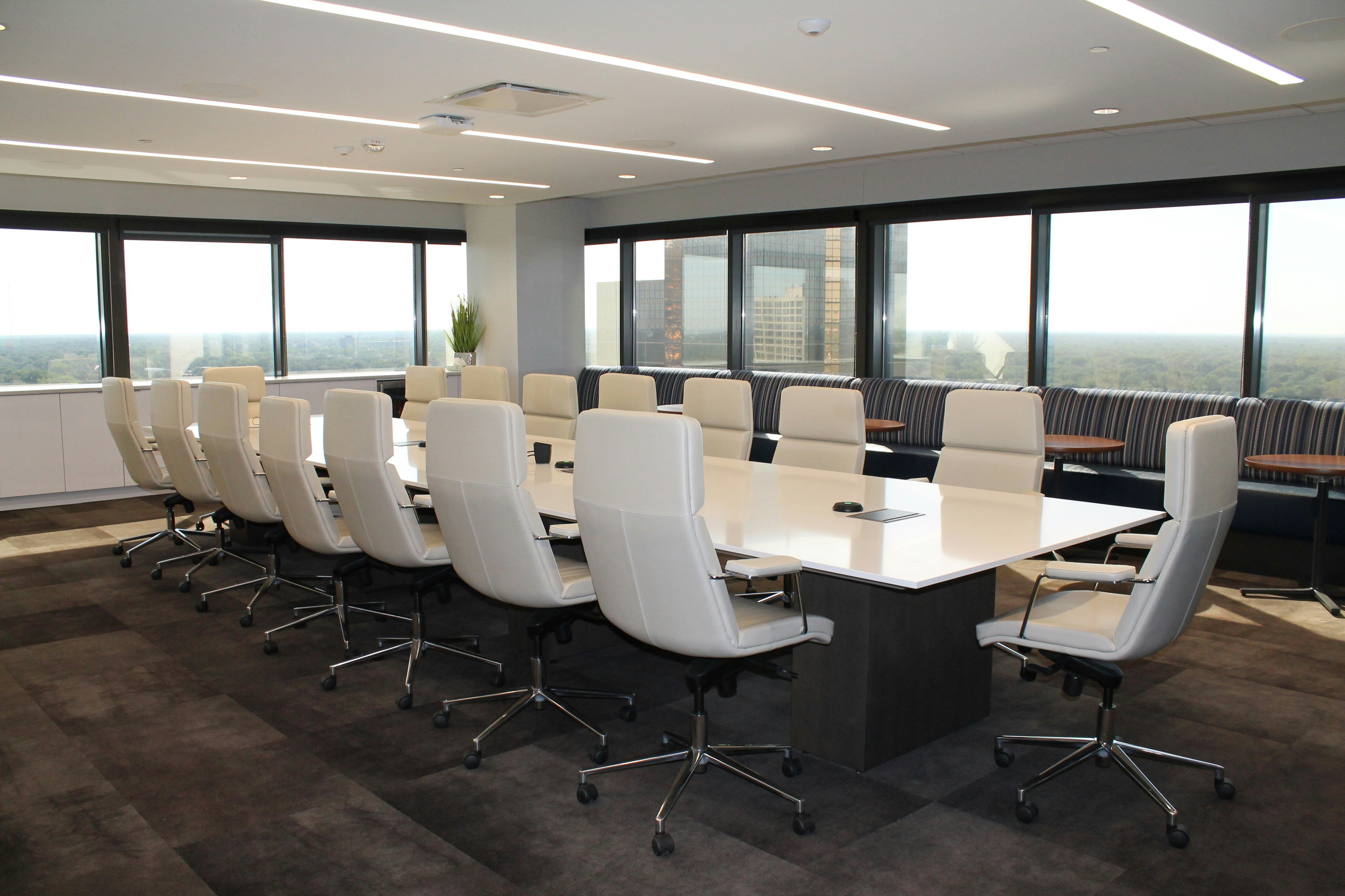 An empty board room waiting for the right people to sit in the right seats