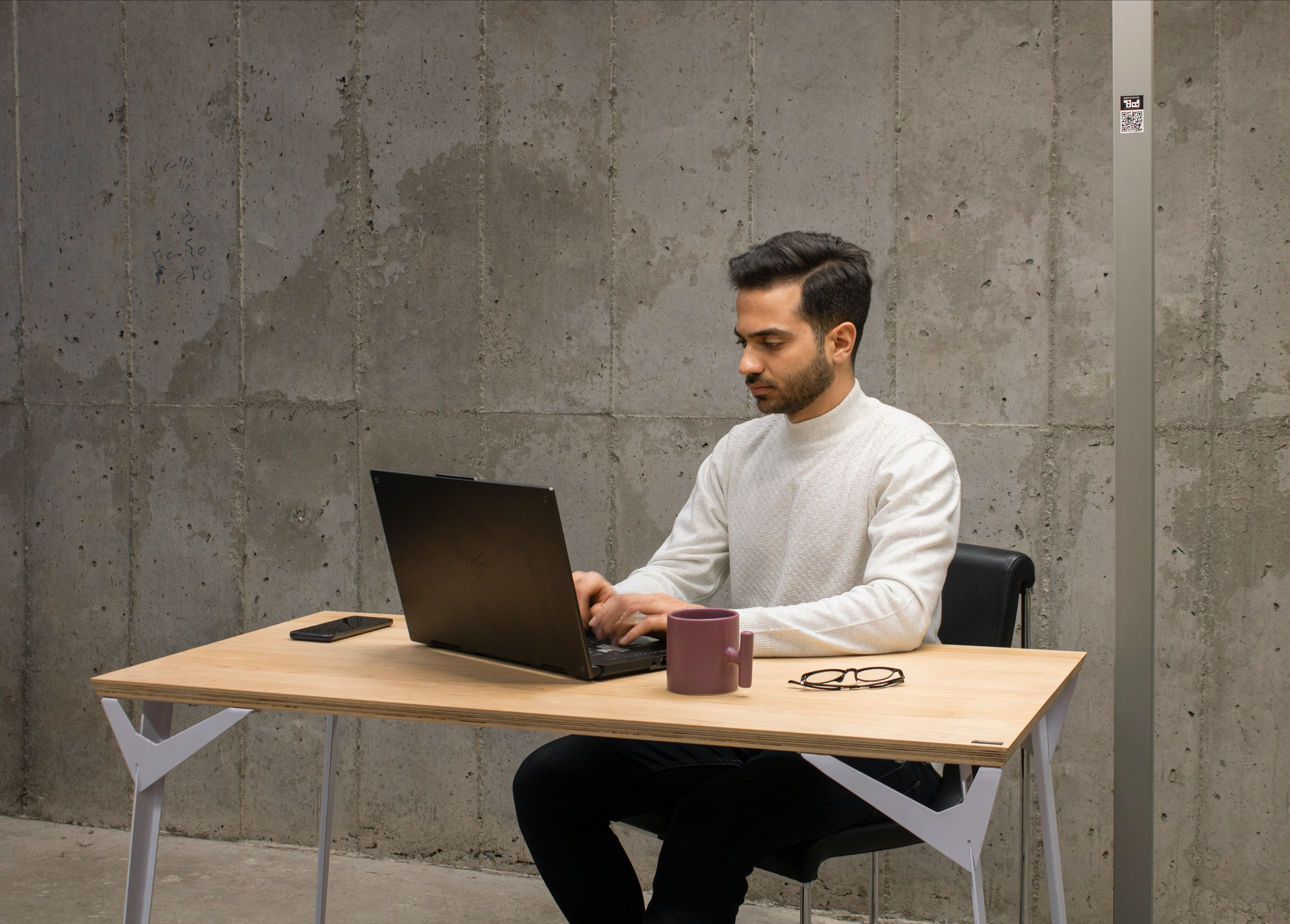 Man at laptop changing his password to be more secure